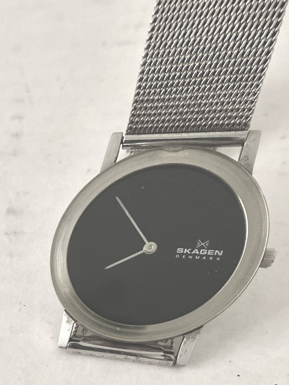 Skagen Modern Unisex Silver Mesh Watch with Black Dial.